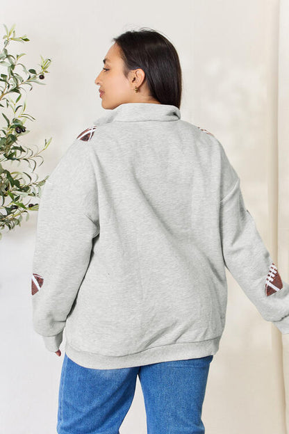 Double Take Full Size Sequin Football Half Zip Long Sleeve Women Sweatshirt